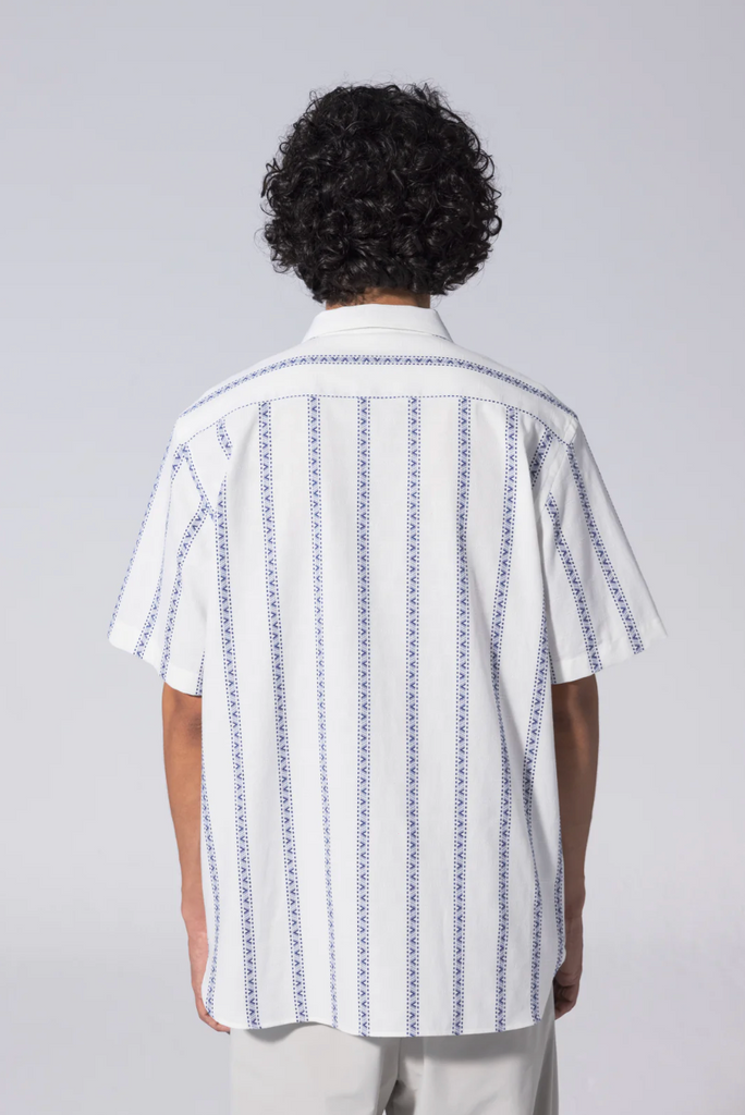 Unfeigned Short Sleeve Shirt Embroidery - White/Blue: White and blue short sleeve shirt with mother of pearl buttons, front pockets, and intricate embroidery
