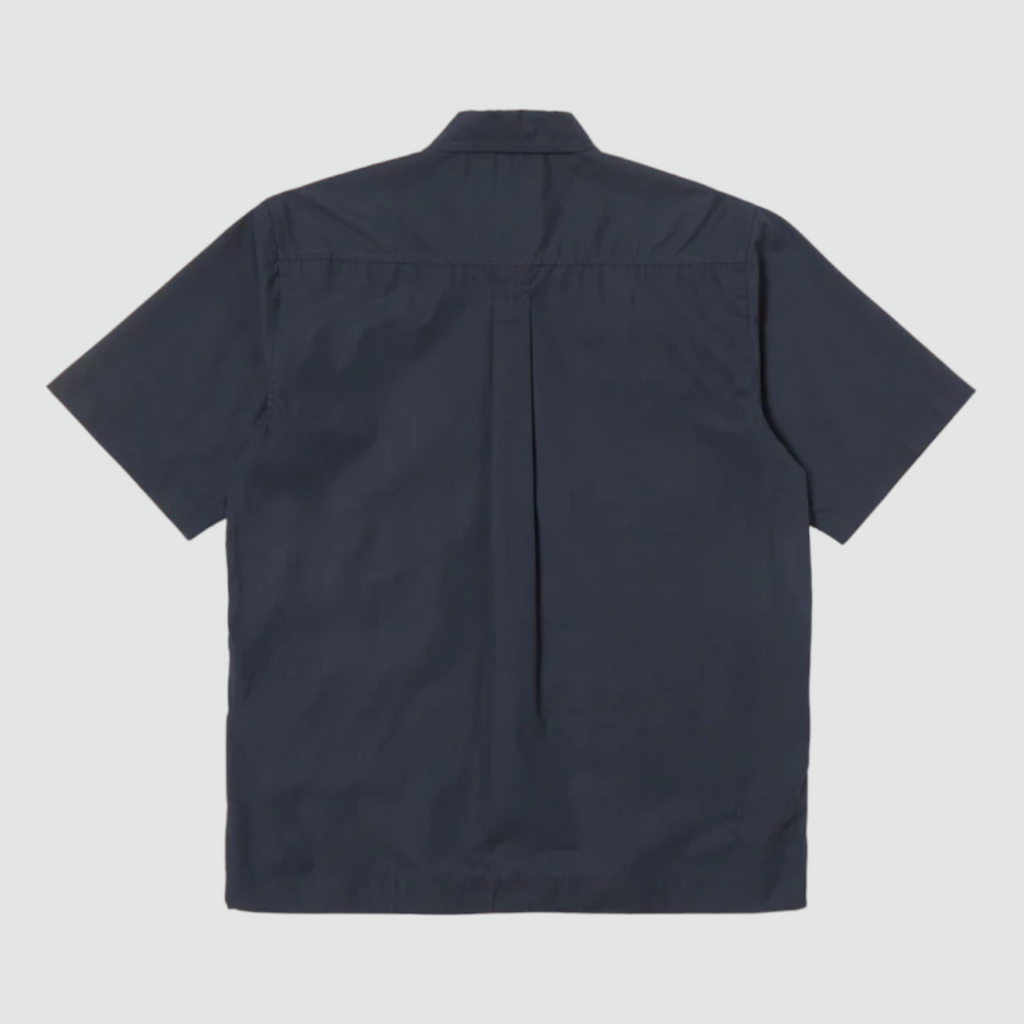 Universal Works Tech Overshirt in Navy Recycled Poly Tech - Contemporary square fit overshirt with discreet zippable side pockets. Crafted from recycled polyester and cotton blend for superior comfort and moisture resistance