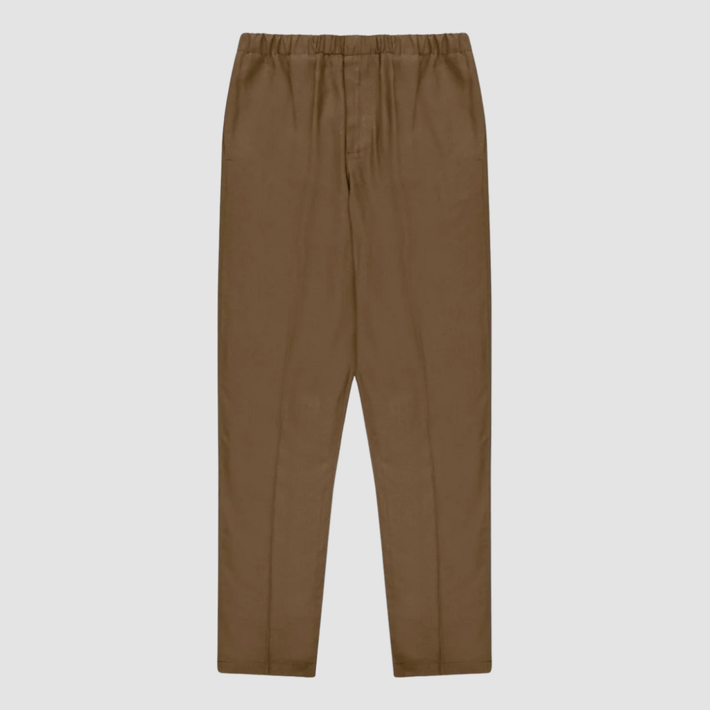 A pair of loose-fit trousers in a soft linen-blend fabric, featuring an elastic waistband, front pockets, and back pockets with flaps.