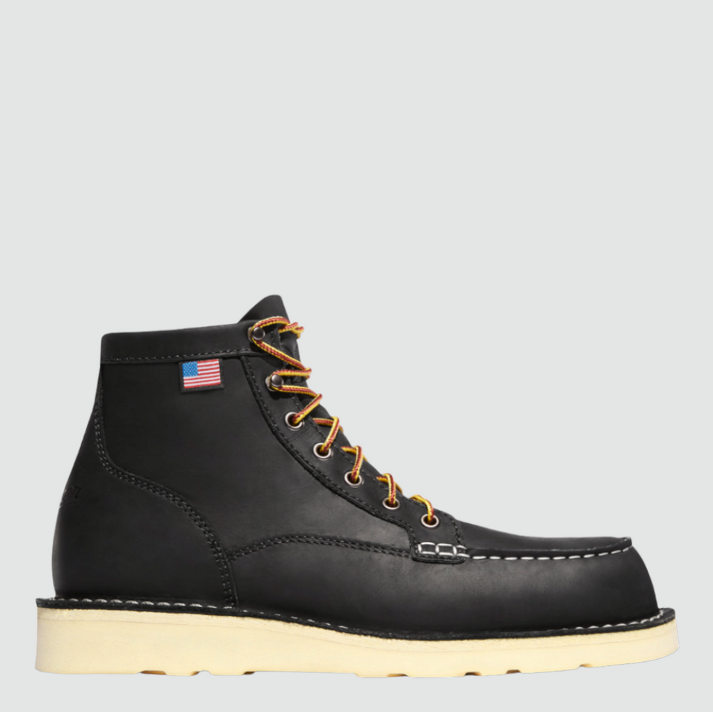 Black leather Danner Bull Run Moc Toe work boot with steel toe, slip-resistant sole, and classic moccasin stitching.