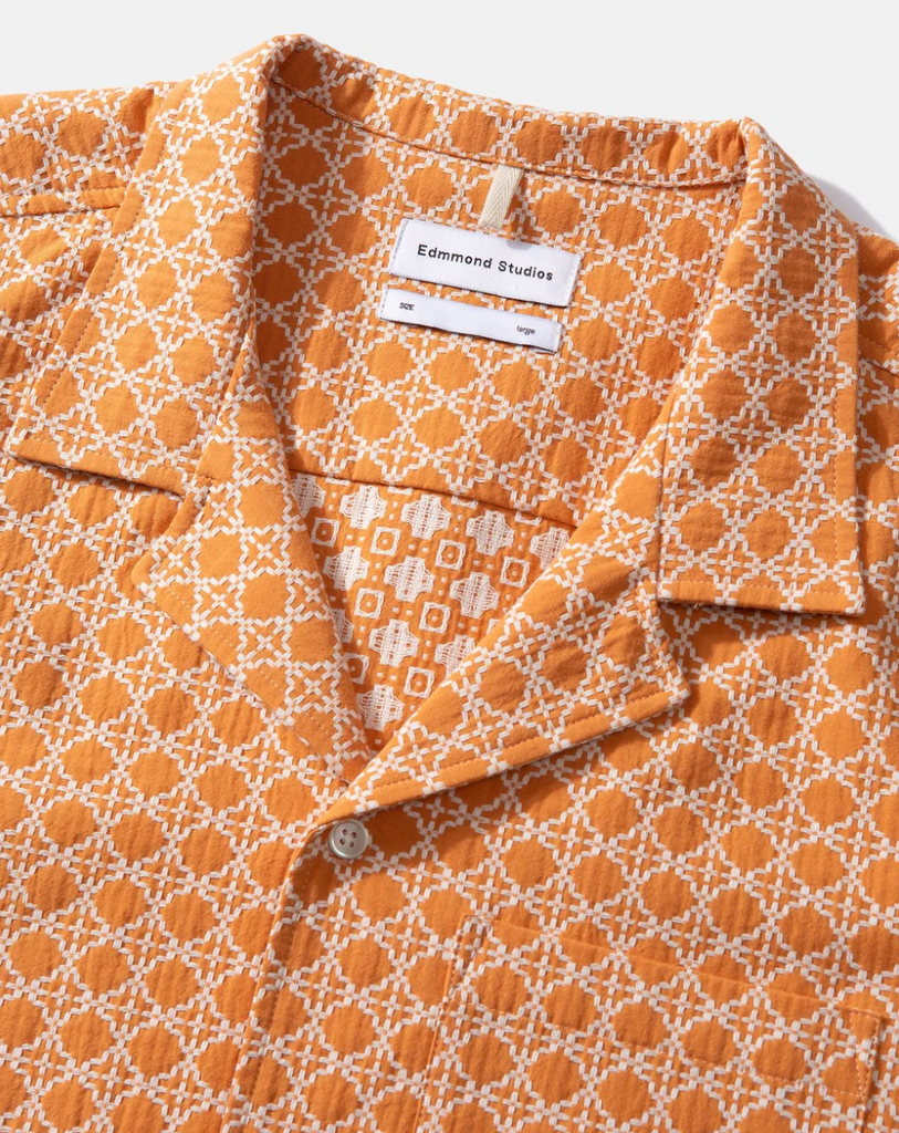 Edmmond Studios Artisan Short Sleeve Shirt in Orange with geometric white thread print, made from 100% cotton for a stylish and comfortable fit.