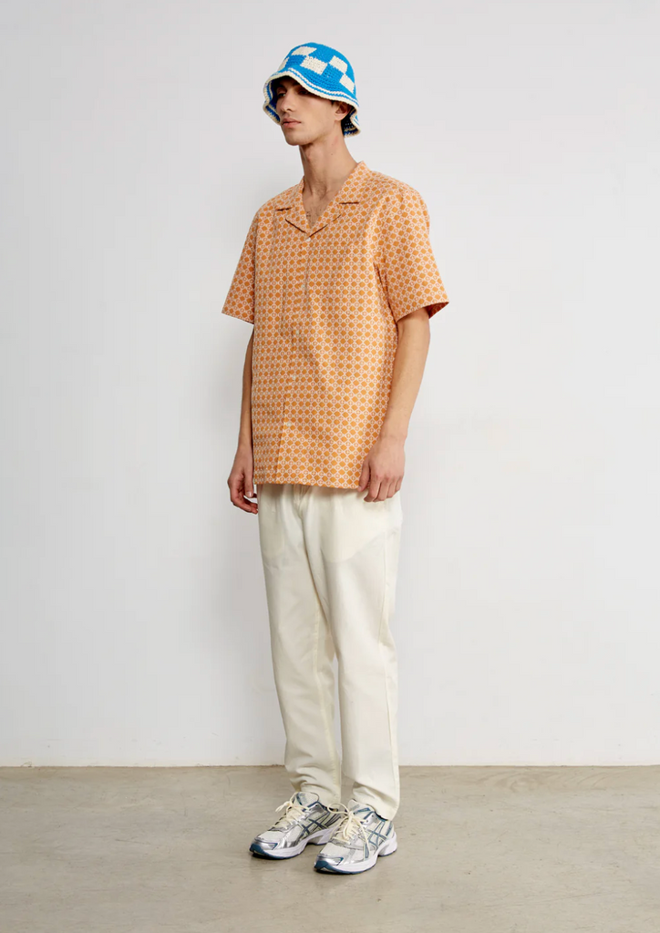 Edmmond Studios Artisan Short Sleeve Shirt in Orange with geometric white thread print, made from 100% cotton for a stylish and comfortable fit.