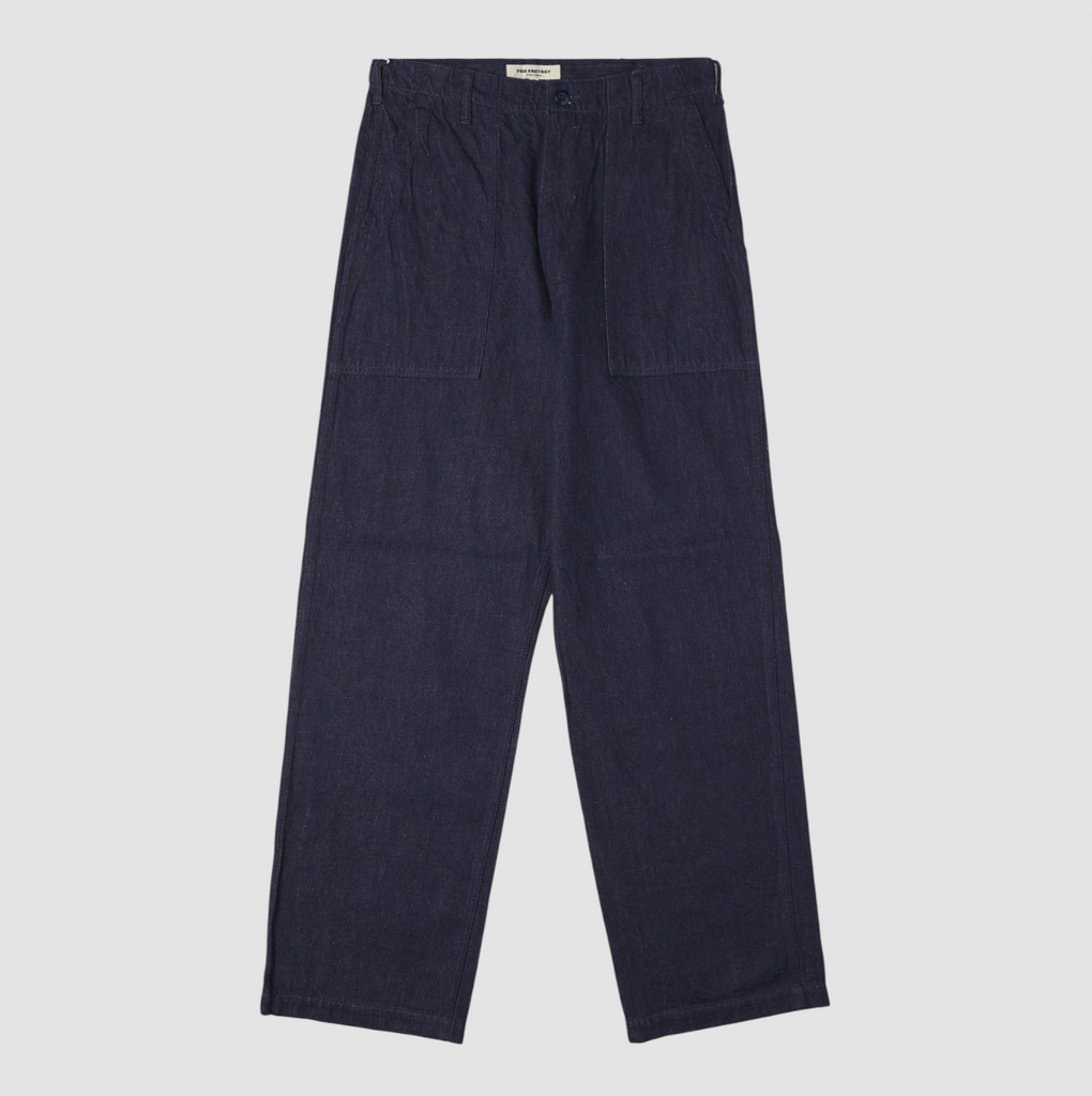 Denim baker pants on light grey background. 