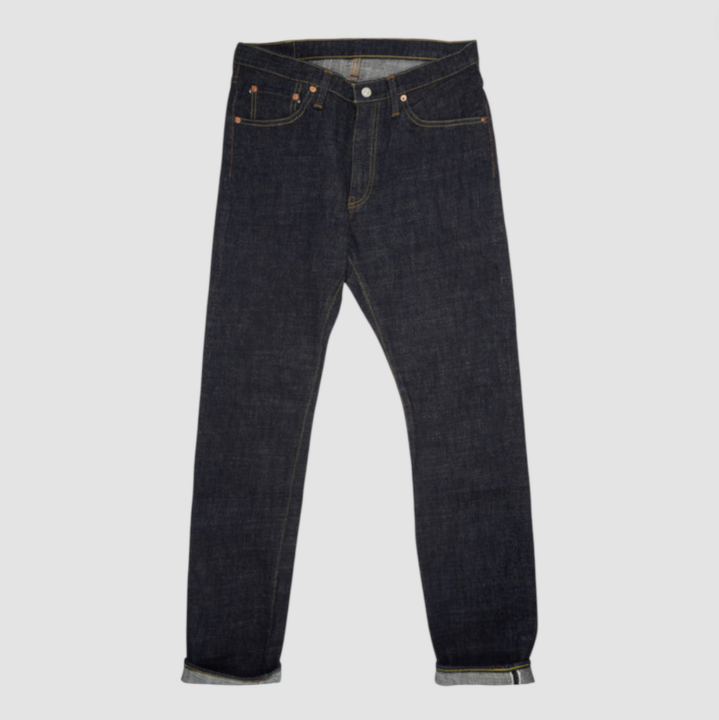 Japanese selvedge denim jeans on a light grey background.