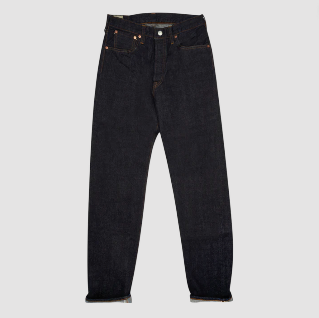 Japanese selvedge denim jeans on a light grey background.