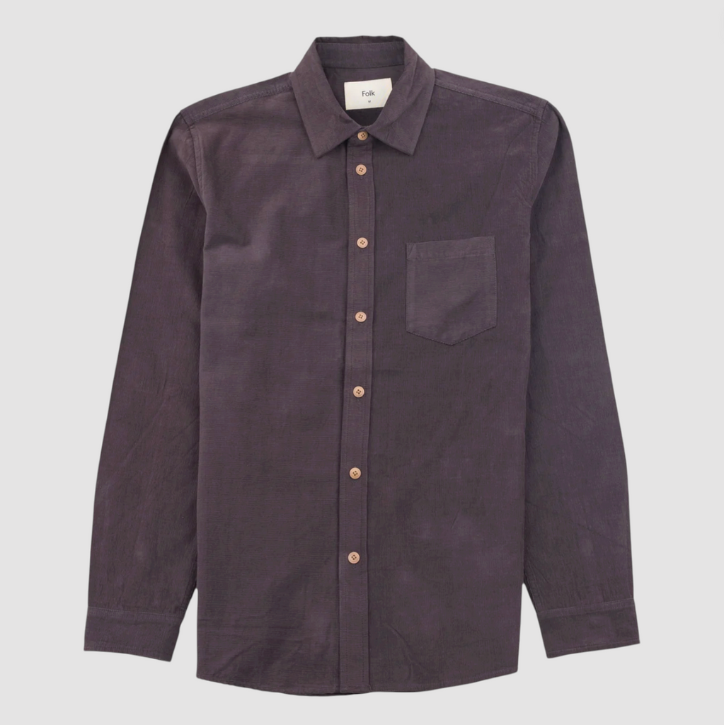 Dark purple shirt with button details on a light gray background.