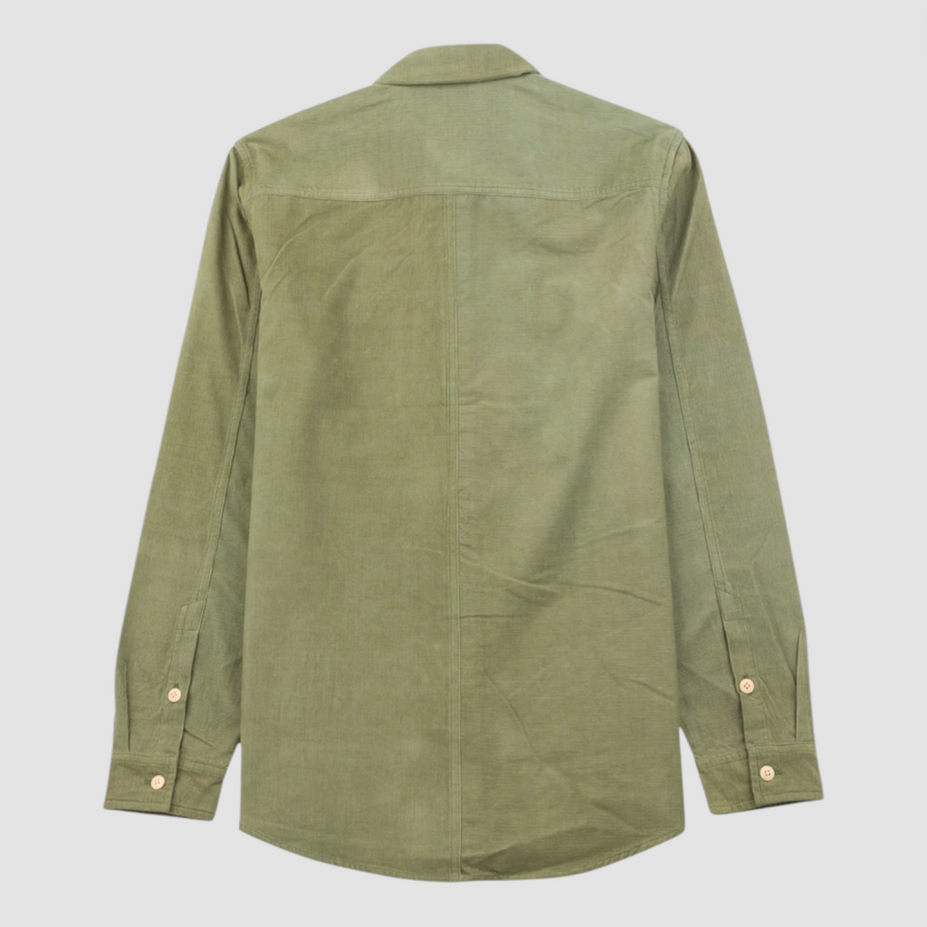 Green shirt on a light gray background.