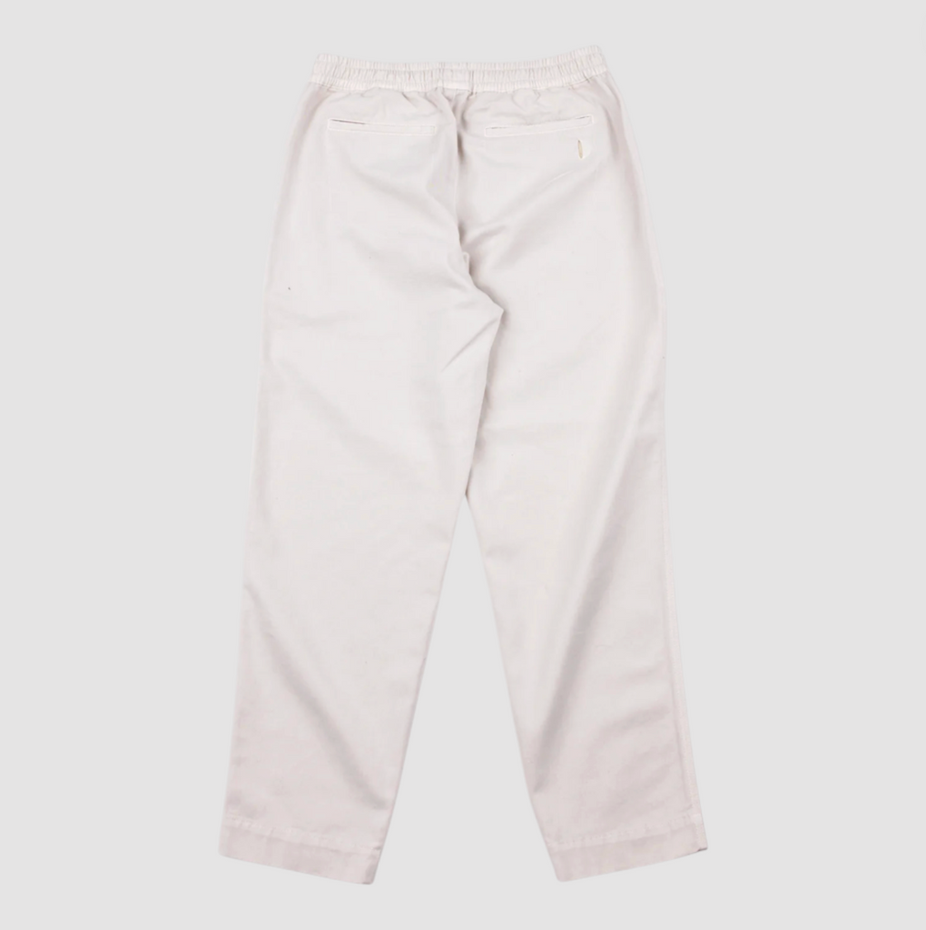 Ecru pants on a white background.