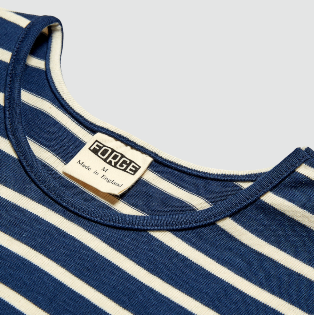 Classic striped Breton long sleeve shirt in navy and ecru, featuring a regular fit and 250 gsm jersey fabric, crafted in England with premium materials.