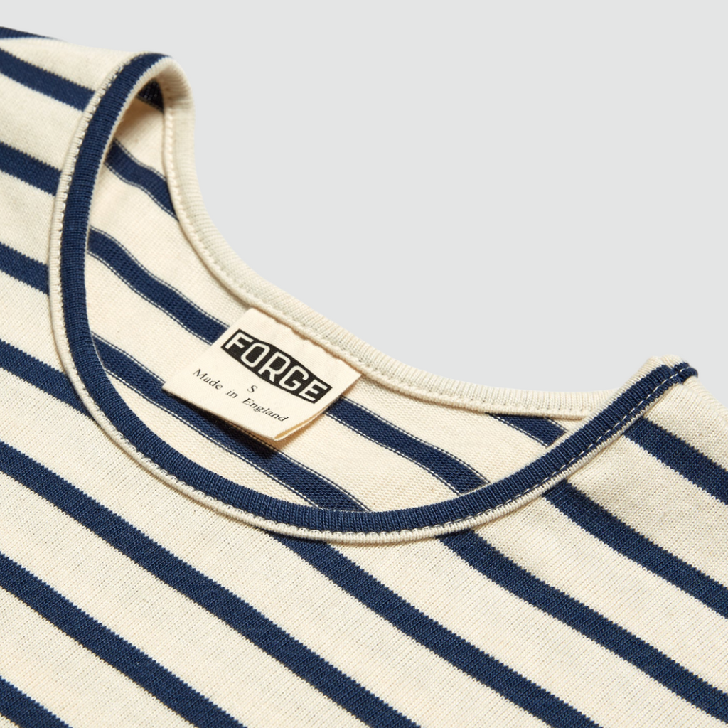 A stylish ecru and navy Breton tee with a regular fit, made from 250 gsm jersey fabric, sourced and knitted in England, available in short or long sleeves.