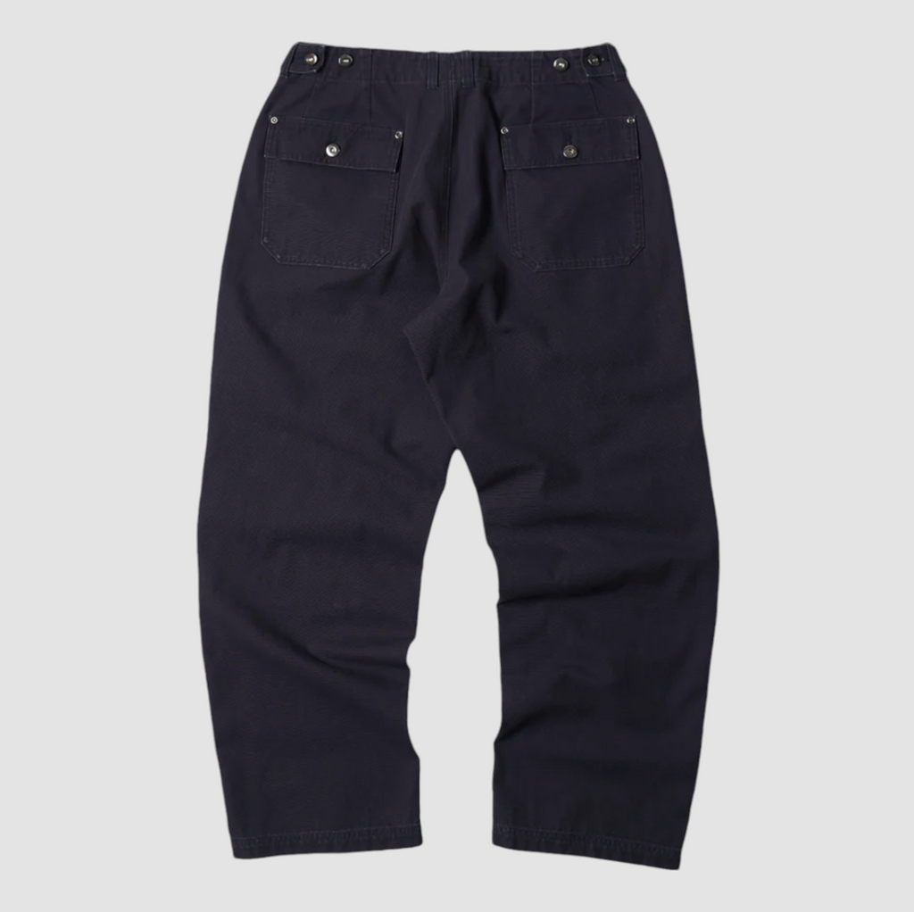 Navy double knee work pants made from durable cotton canvas with a vintage wash and wide-leg fit. Features rear flap pockets and rivet details.