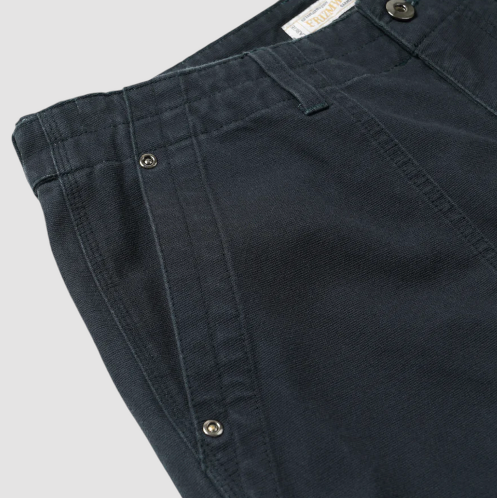 Navy double knee work pants made from durable cotton canvas with a vintage wash and wide-leg fit. Features rear flap pockets and rivet details.