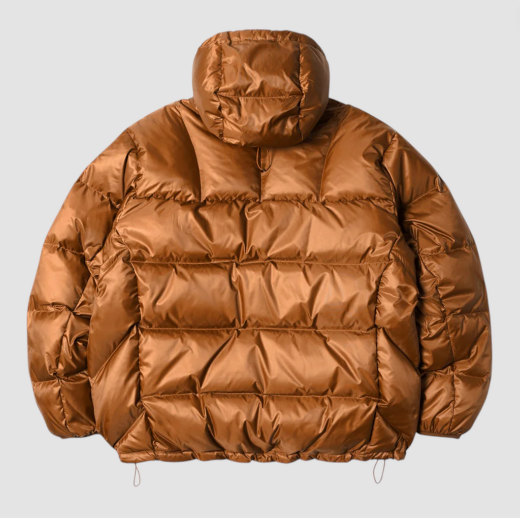 Orange puffer jacket on a light gray background.