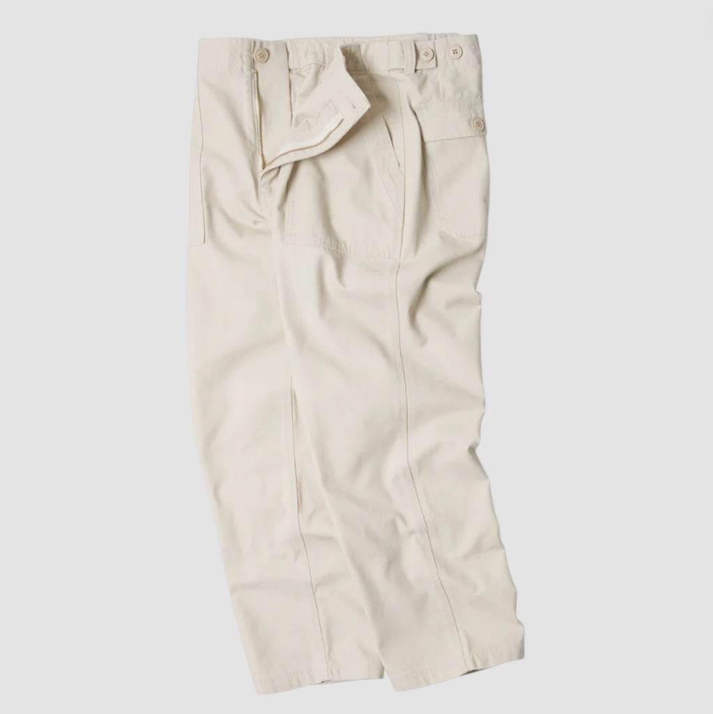 Beige pants on a light gray background.