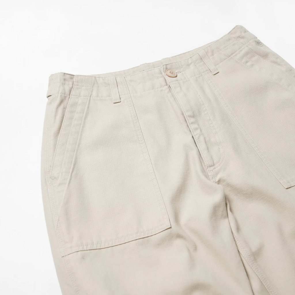Beige pants on a white background.