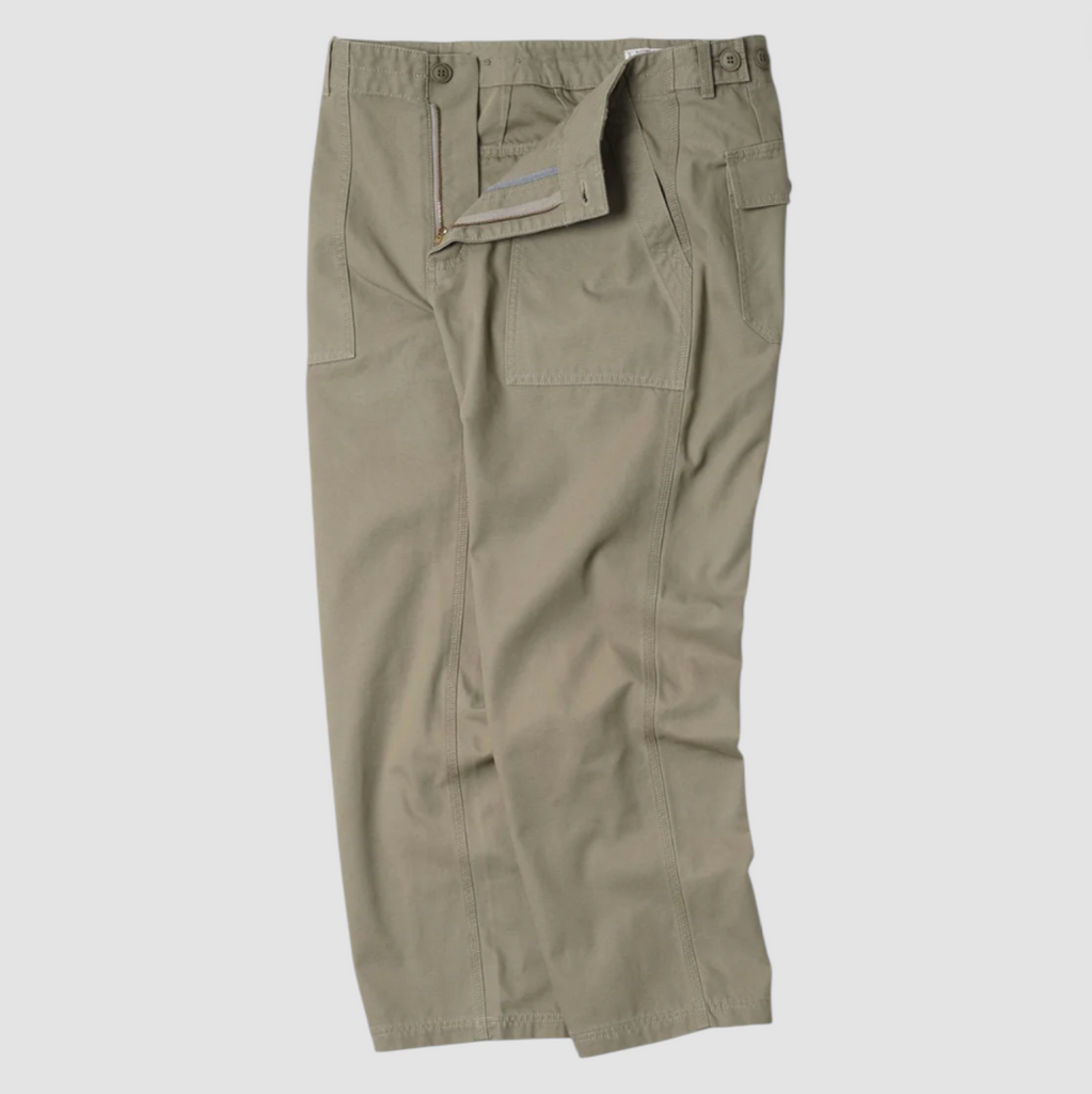 Khaki pants on a light gray background.