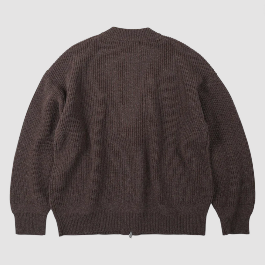 Brown ribbed sweater on a light gray background.