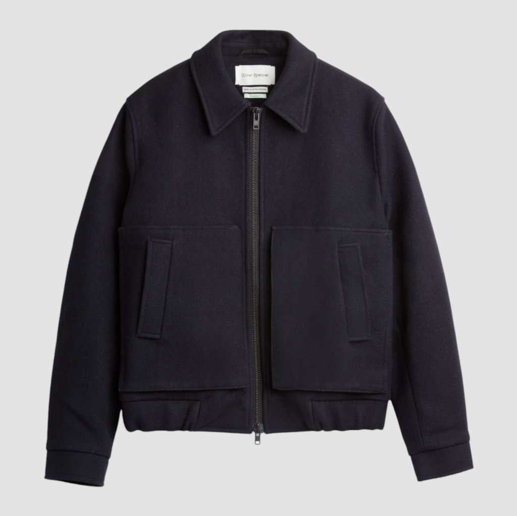 Oliver Spencer Arlington Bomber Jacket in Navy, made from a recycled wool blend with a zip front, turn-down collar, and tailored urban design.