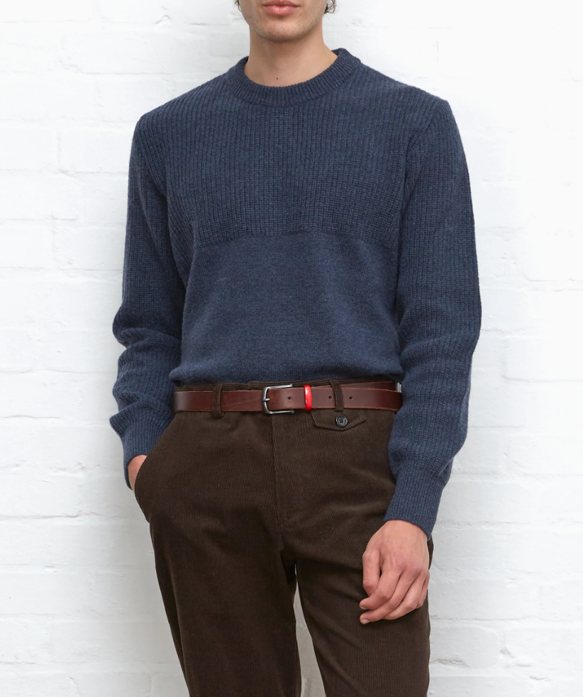 A navy jumper made from 100% extrafine wool with ribbed details, a chest pocket, and a regular fit, featuring a double-faced contrast neck-ringer.