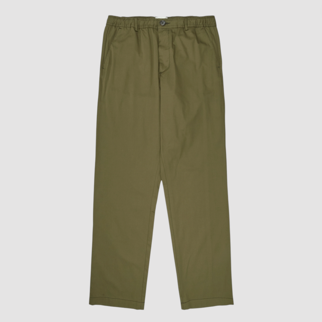 Green pants on a light gray background.