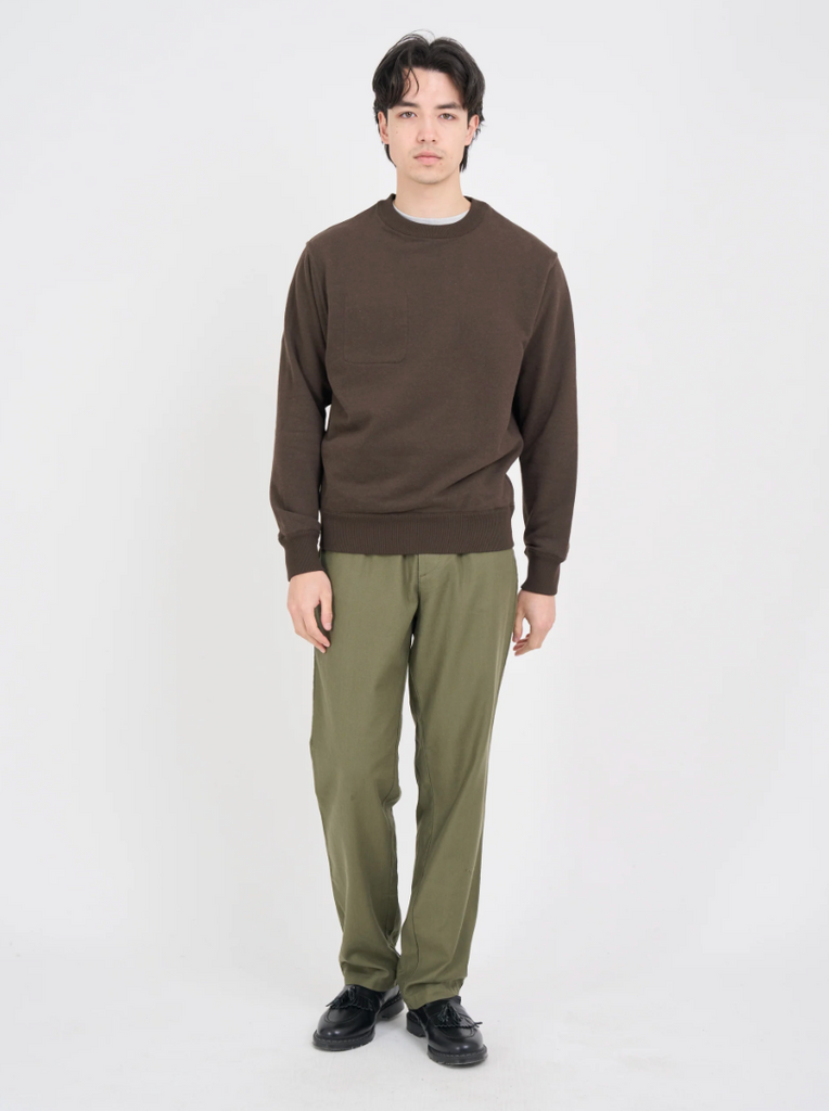 Green relaxed-fit drawstring trousers with a straight-leg cut, crafted from a midweight cotton-linen blend with a herringbone weave, featuring back pockets.