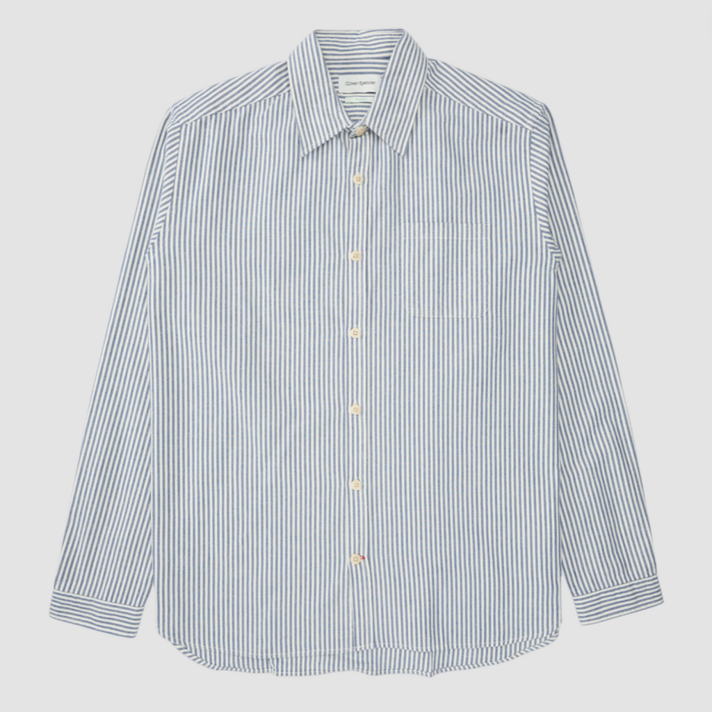 Striped shirt with long sleeves on a light gray background.