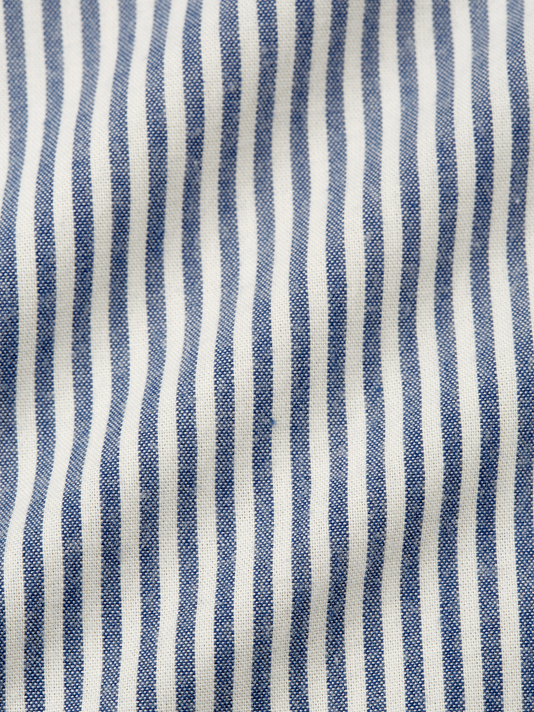 Close-up of blue and white striped fabric.