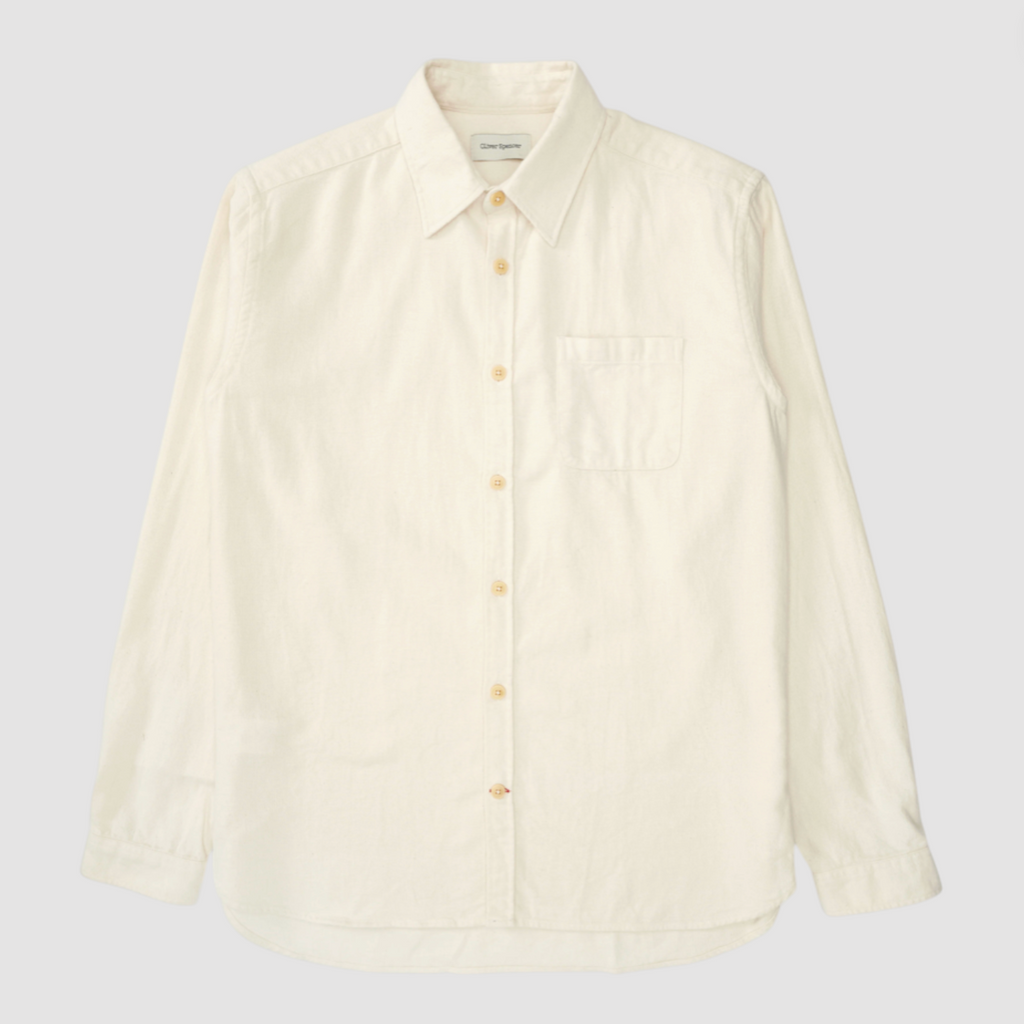 Cream button-up shirt on a light gray background.