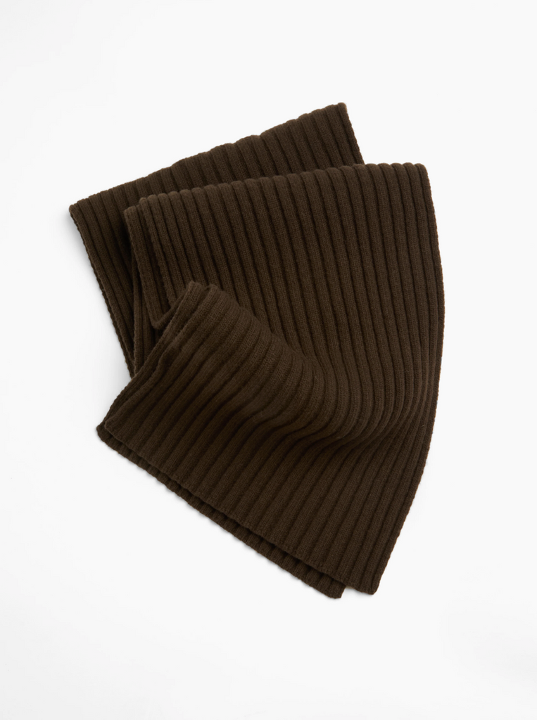Brown ribbed knit scarf on a white background.