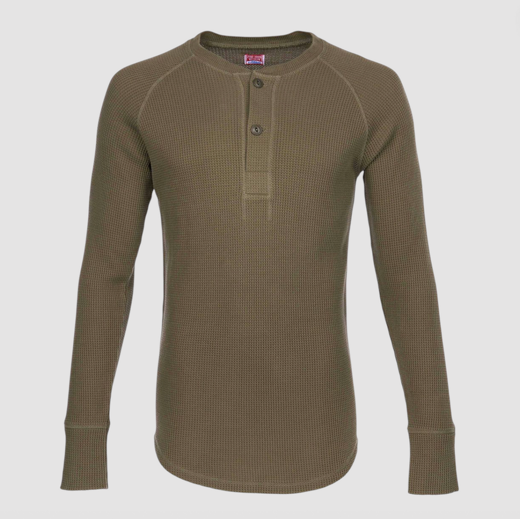 Green long-sleeve tshirt on a white background.