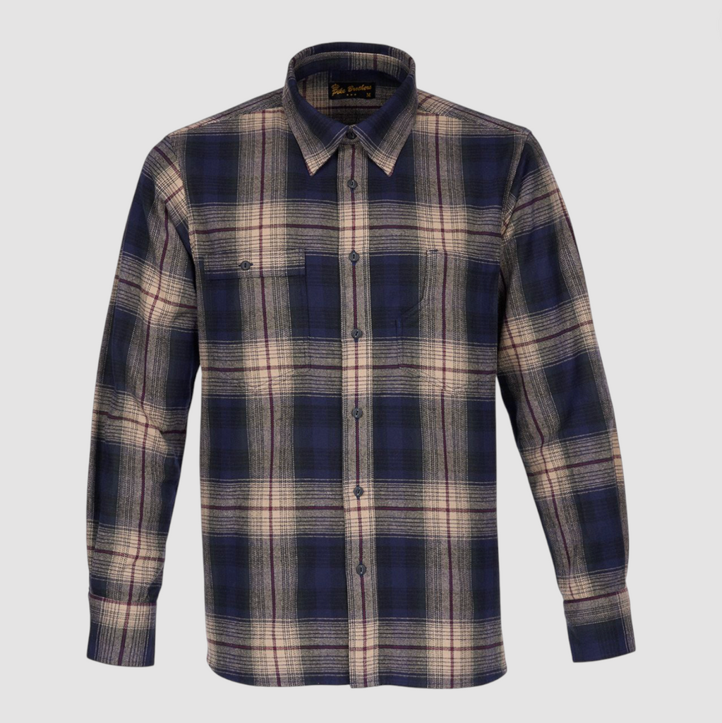Plaid shirt with a visible brand label on a light gray background.