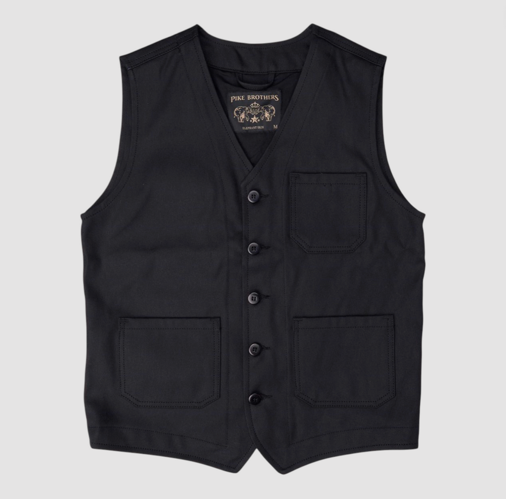 Black vest with button details on a light gray background.
