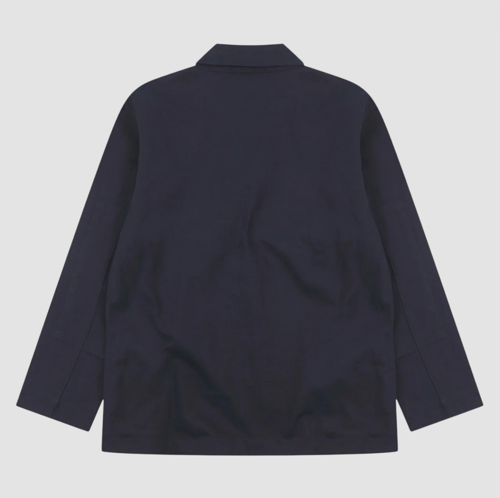 Navy blue blazer on a light gray background.