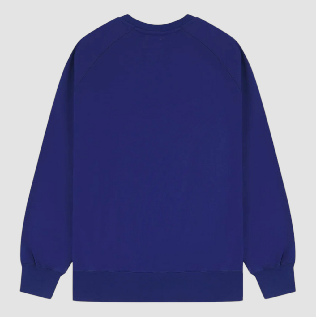 USKEES #7005 Ultra Blue Sweatshirt, enzyme-washed organic cotton, ribbed hem and cuffs, crew neck, raglan sleeves, and relaxed regular fit.