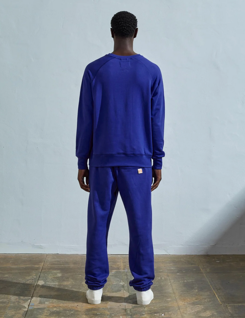 USKEES #7005 Ultra Blue Sweatshirt, enzyme-washed organic cotton, ribbed hem and cuffs, crew neck, raglan sleeves, and relaxed regular fit.