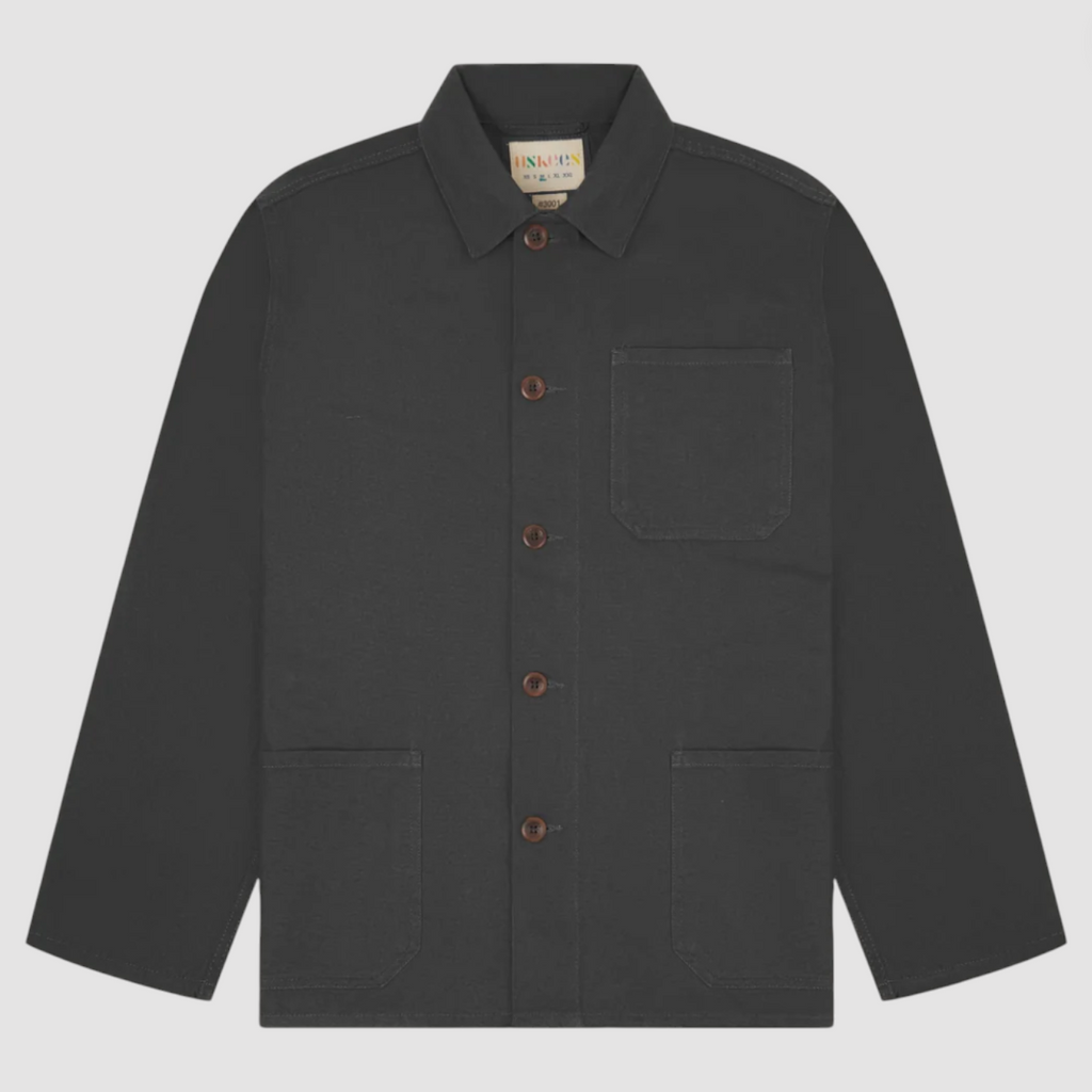 Charcoal organic cotton overshirt with chest pockets, reinforced elbows, and corozo buttons.