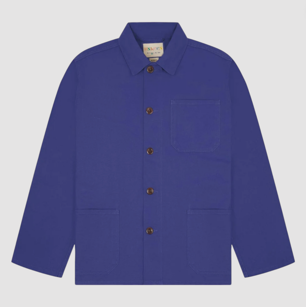 Organic cotton overshirt in ultra blue with deep pockets, reinforced elbows, and corozo buttons.