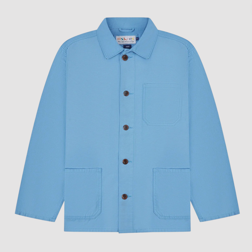 Light blue jacket with button details on a light gray background.