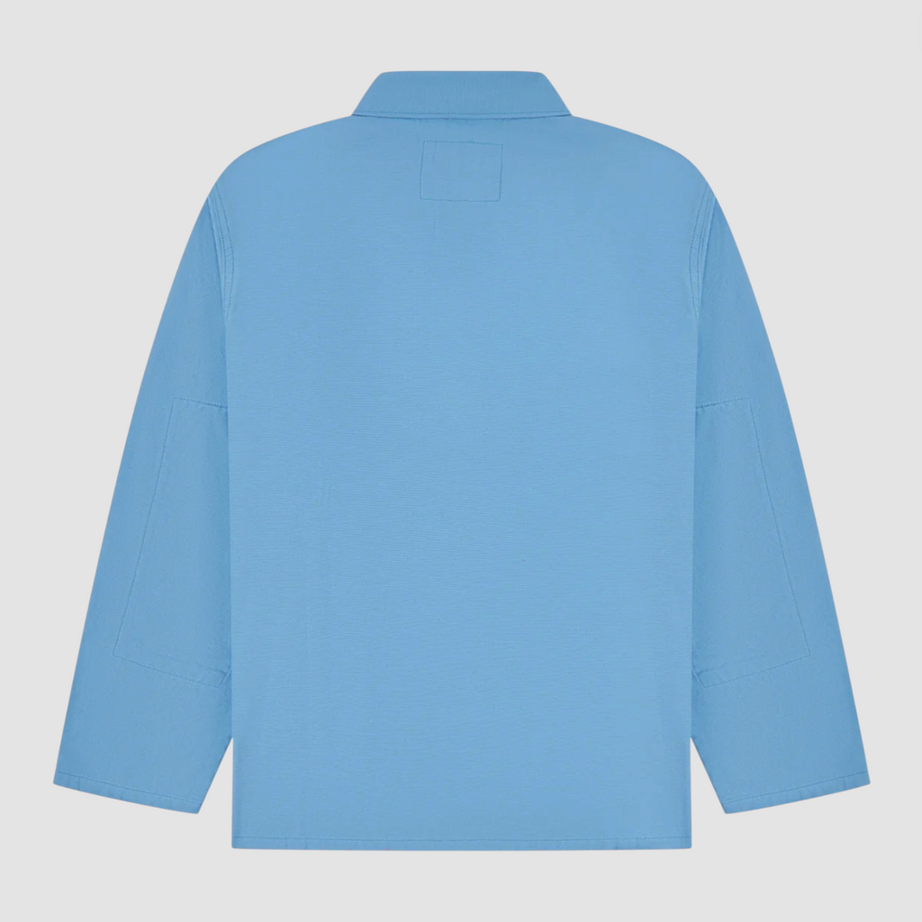 Light blue jacket on a gray background.