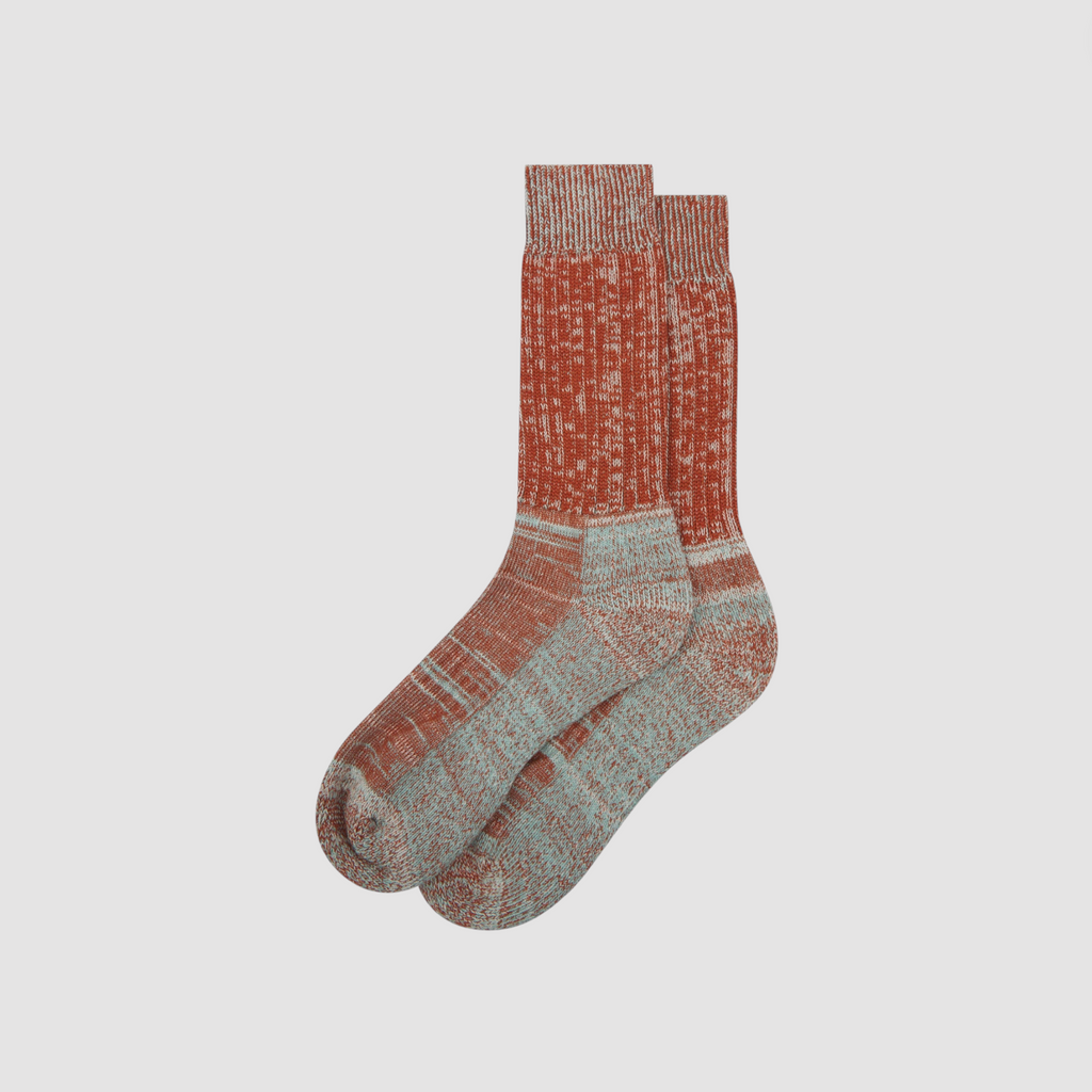 Pair of patterned socks on a light gray background.
