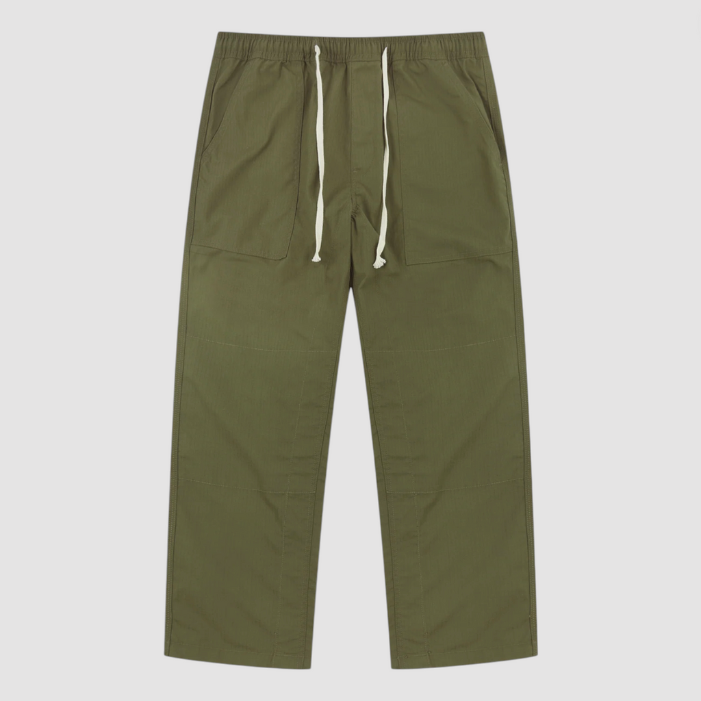 Green pants with a drawstring on a white background.