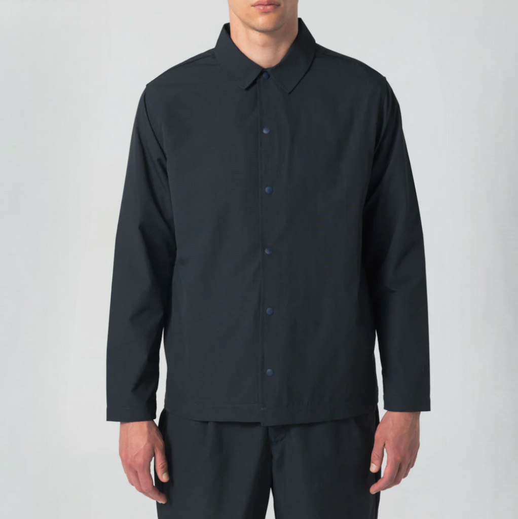 Sleek Modern Smart Jacket: Crafted from 100% recycled fibers with snap buttons and side pockets. Made in Portugal