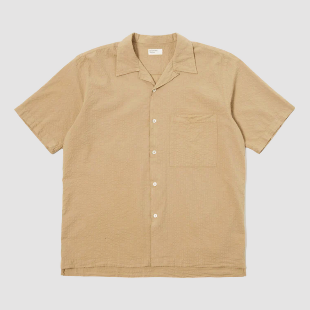 Universal Works Camp Shirt II in Summer Oak Onda Cotton: Relaxed fit shirt with modern design, crafted from lightweight, garment-dyed cotton. Ideal for summer with its comfortable feel and stylish details