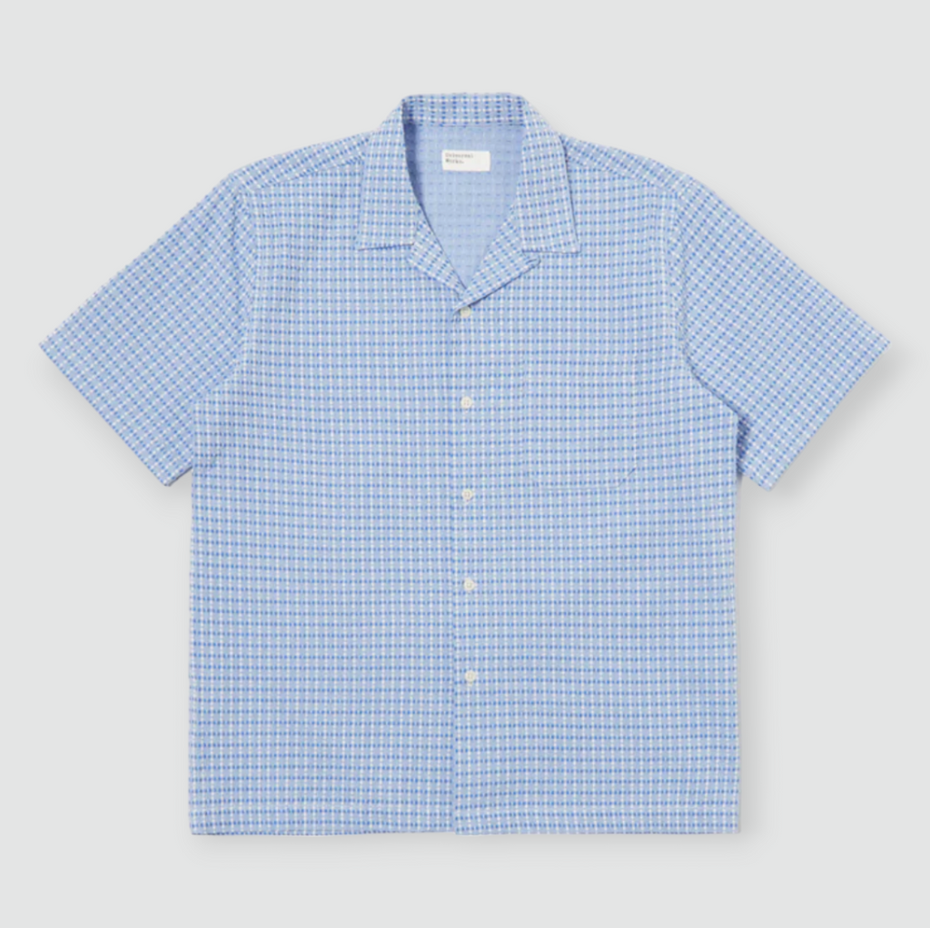 Universal Works Road Shirt in Blue Delos Cotton - Classic yet relaxed short-sleeved summer shirt with loop-close top button, crafted from premium dobby weave fabric for timeless style and comfort