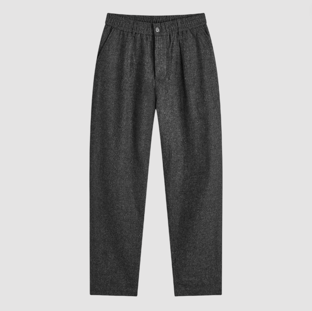 Dark gray pants on a light gray background.