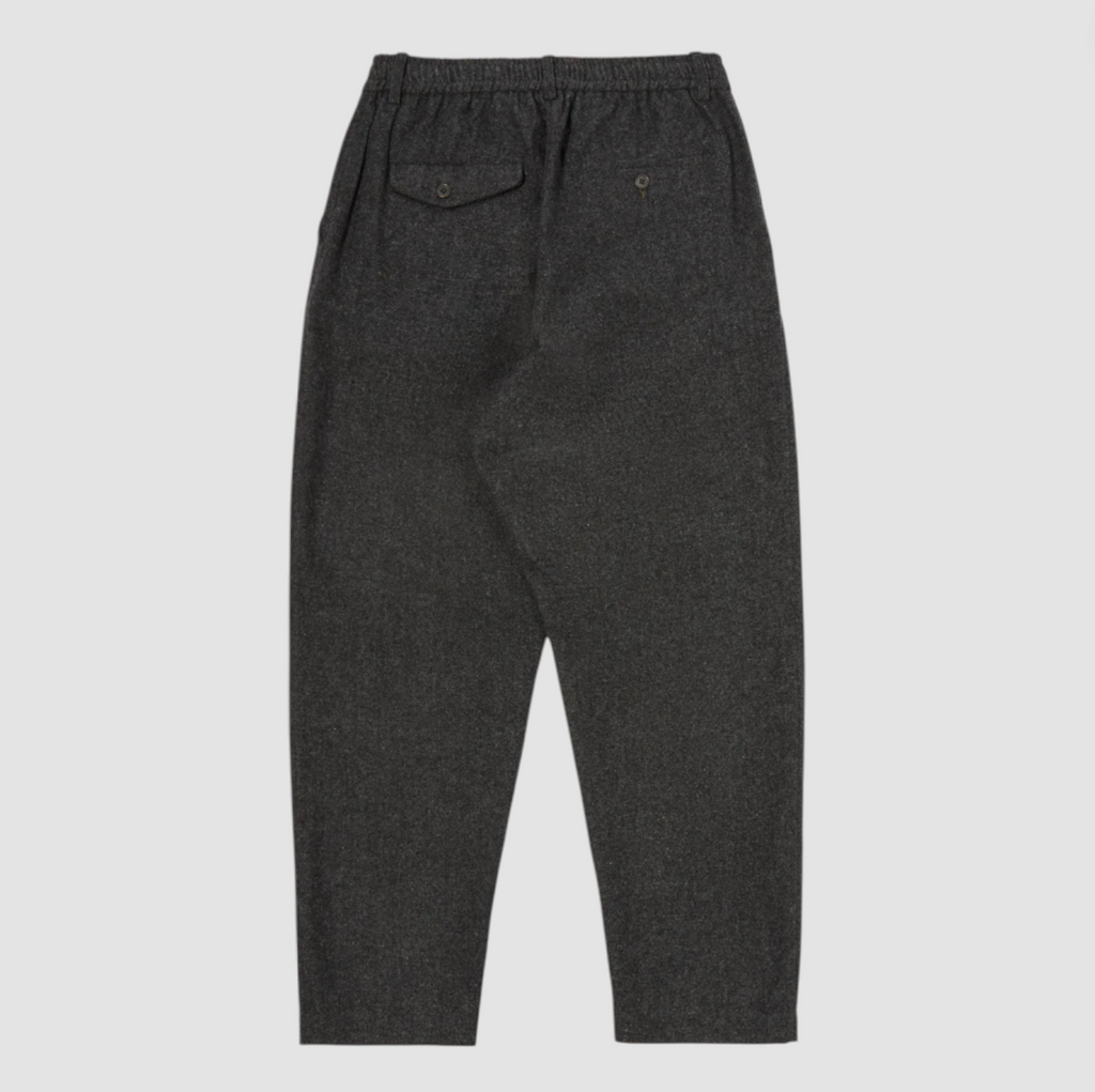 Dark gray pants on a light gray background.
