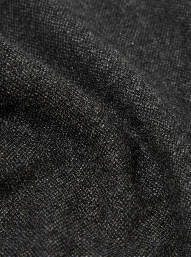 Close-up of dark gray fabric texture.