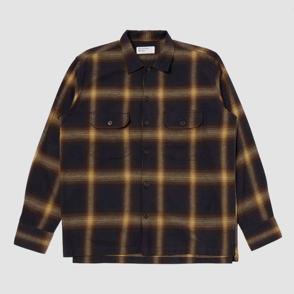 Plaid shirt with brown and navy pattern on a light gray background.