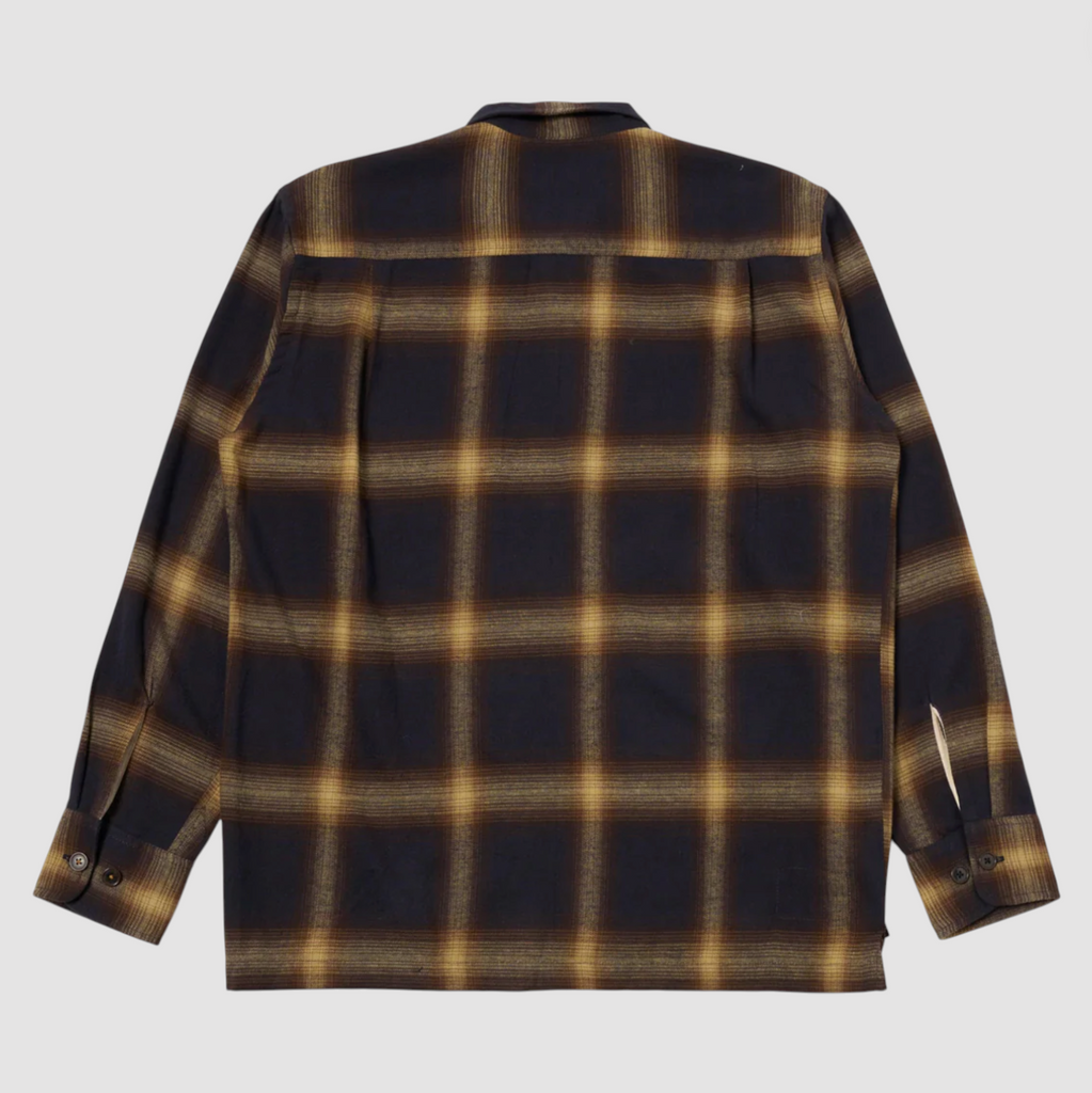 Plaid shirt with brown and navy pattern on a light gray background.