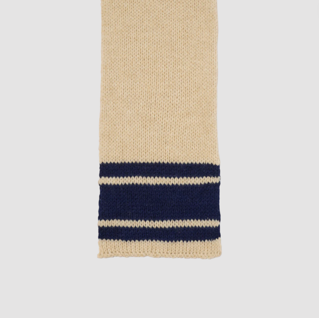 Beige and navy wool scarf.